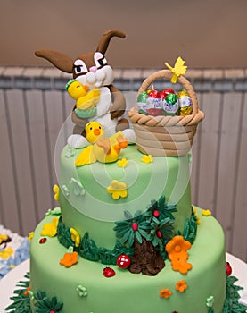 Baby boy birthday cake with bunny decoration