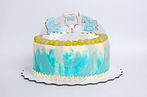 Baby boy birthday cake with gingerbread and grapes