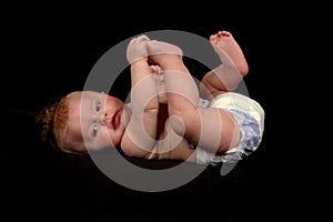 Baby boy with black background