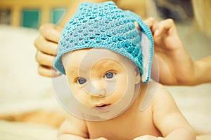 Baby boy with blue hat