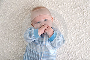 Baby Boy in Blue and White Striped Pajamas