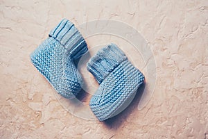 Baby boy booties. Shoes for newborns. Children`s clothing.