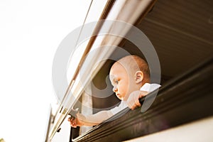 Baby boy in a camper van.