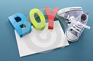 Baby boy card with text and shoes