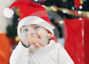Baby boy in Christmas costume crawling
