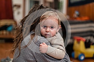 Baby boy in cuddle moment with mom