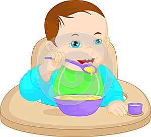 Baby boy eating baby food