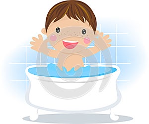 Baby boy having a bath