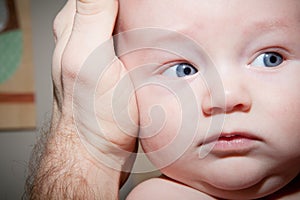 Baby Boy Held by His Father