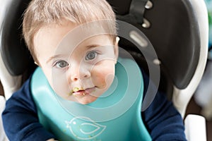 Baby boy in high chair