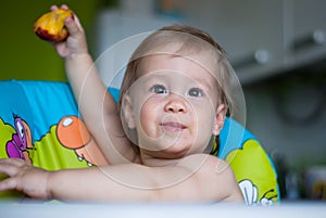 Baby boy in highchair