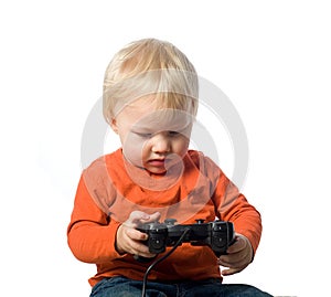 Baby boy holding a video game controller