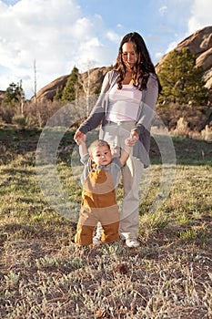 Baby boy learning to walk