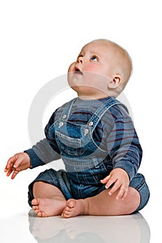 Baby boy looking up