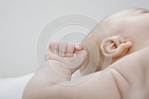 Baby boy lying down close-up