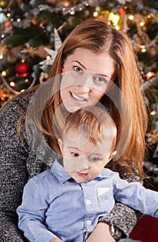 Baby boy and mommy, Christmas portrait