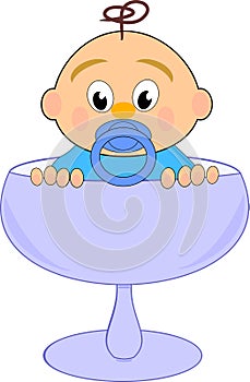 Baby boy with nipple in blue glass photo