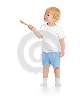 Baby boy with paint brush front view standing full length