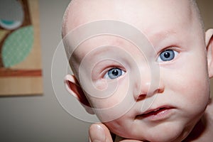 Baby Boy With Perfect Skin and Big Blue Eyes