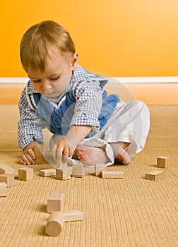 Baby boy playing with blocks