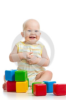 Baby boy playing with building blocks