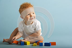 Baby Boy Playing With Building Blocks