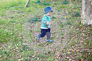 Baby boy playing on grass