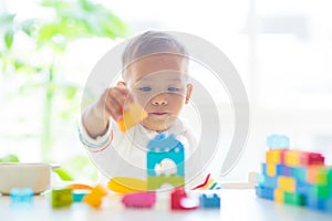 Baby boy playing with toy