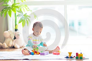 Baby boy playing with toy