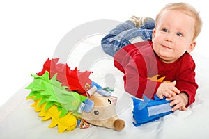 Baby boy playing with toys