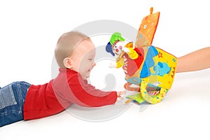 Baby boy playing with toys