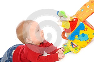 Baby boy playing with toys