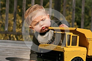 Baby Boy Playing with Truck