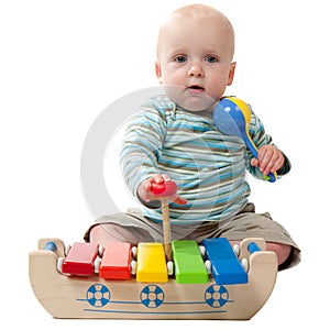 Baby Boy Playing with Xylophone photo