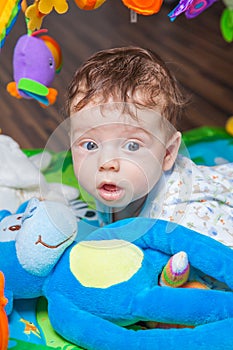 Baby boy on playmat photo