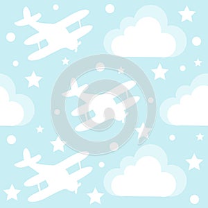Baby boy seamless pattern with cartoon toy airplane and clouds