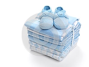 Baby boy shoes on blankets photo