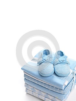 Baby boy shoes and swaddling blankets