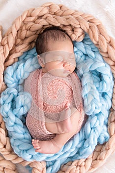 Baby boy sleep on  a white wrap cloth feelgood relaxing