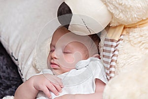 Baby Boy Sleeping with Big Teddy Bear