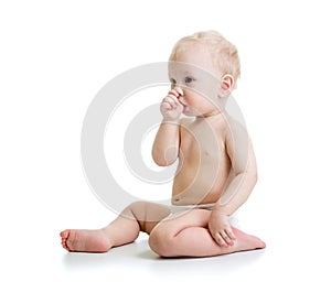 Baby boy suckling thumb isolated