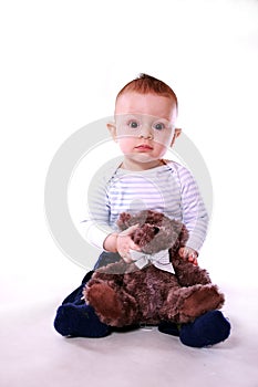 Baby boy with teddy bear