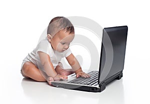 Baby Boy Typing on a Laptop Computer