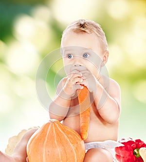 Baby boy with vegetables