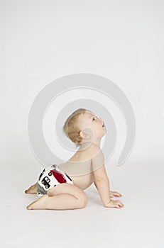 Baby boy wearing cloth reusable nappy