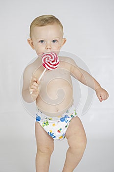 Baby boy wearing cloth reusable nappy