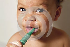 Baby brushing teeth
