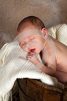 Baby in a bucket