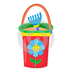 Baby bucket with sand rake isolated on white background. Beach toys for children. Red kids bucket with pattern of flower