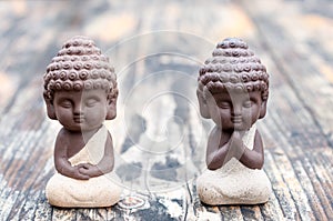 Baby Budda Statues, Teacher or master and apprentice. Two little monks. Meditation and zen, relaxation concept